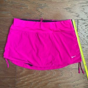 Nike magenta mini skirt